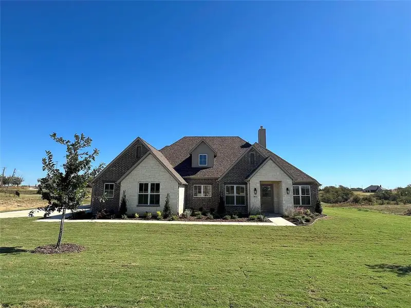 Front exterior of a new home in , Mesquite, TX, highlighting curb appeal (Image 1). Front exterior of a new home in , Mesquite, TX, highlighting curb appeal (Image 1).