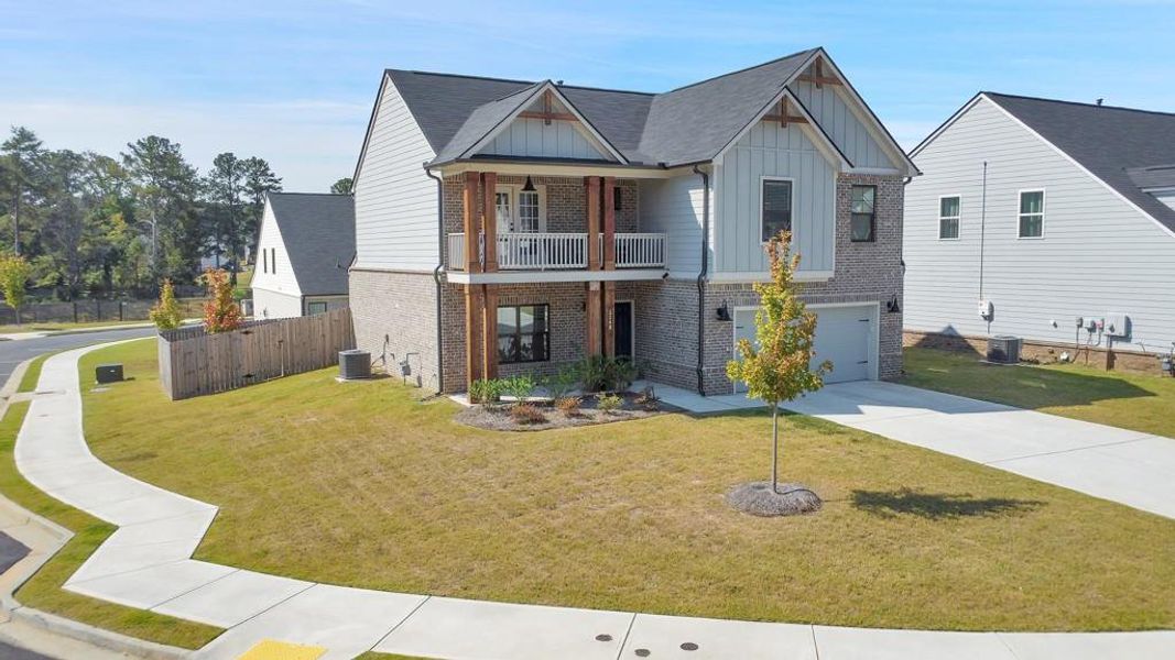 Front exterior of a new home in , Powder Springs, GA, highlighting curb appeal (Image 1).