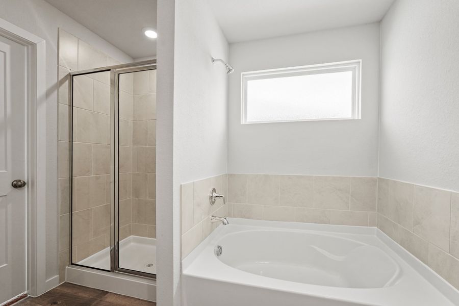 A bathroom with a glass shower.