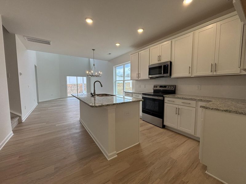 Furnished interior view inside a new home in CraigStone, Woodruff (Image 4).