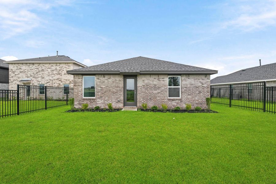 Exterior details and patio area of a home in Sunterra, Katy (Image 22).