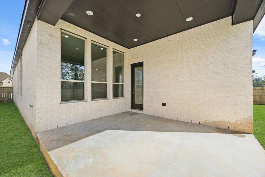 Exterior details and patio area of a home in Grand Central Park: 55ft. lots, Conroe (Image 14).