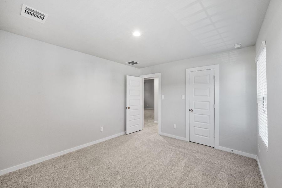 Spacious, unfurnished interior of a new home in Grand Oaks Village, Houston (Image 23).