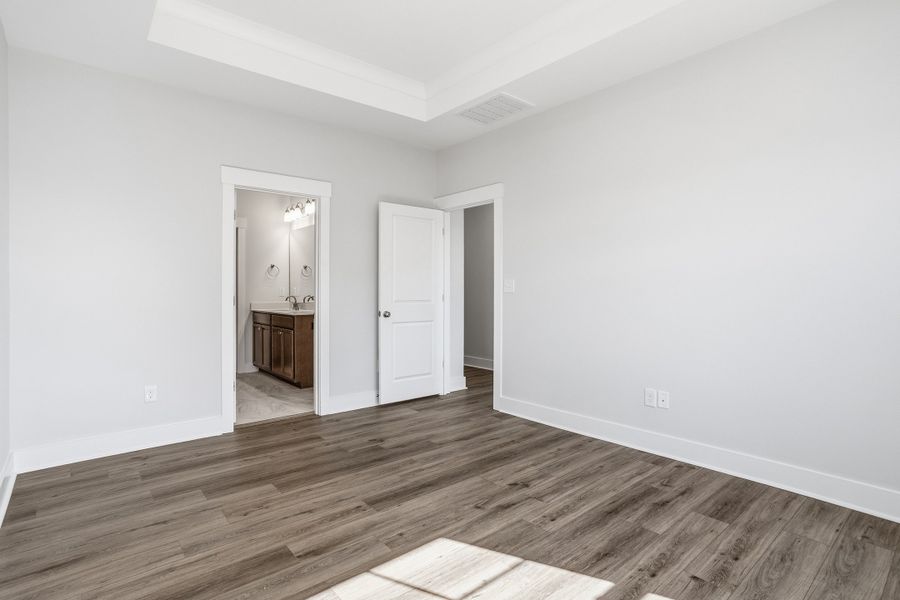 Spacious, unfurnished interior of a new home in Sweetbrier, Durham (Image 28).