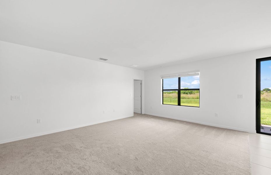 Spacious, unfurnished interior of a new home in Whispering Lakes, Lehigh Acres (Image 21).