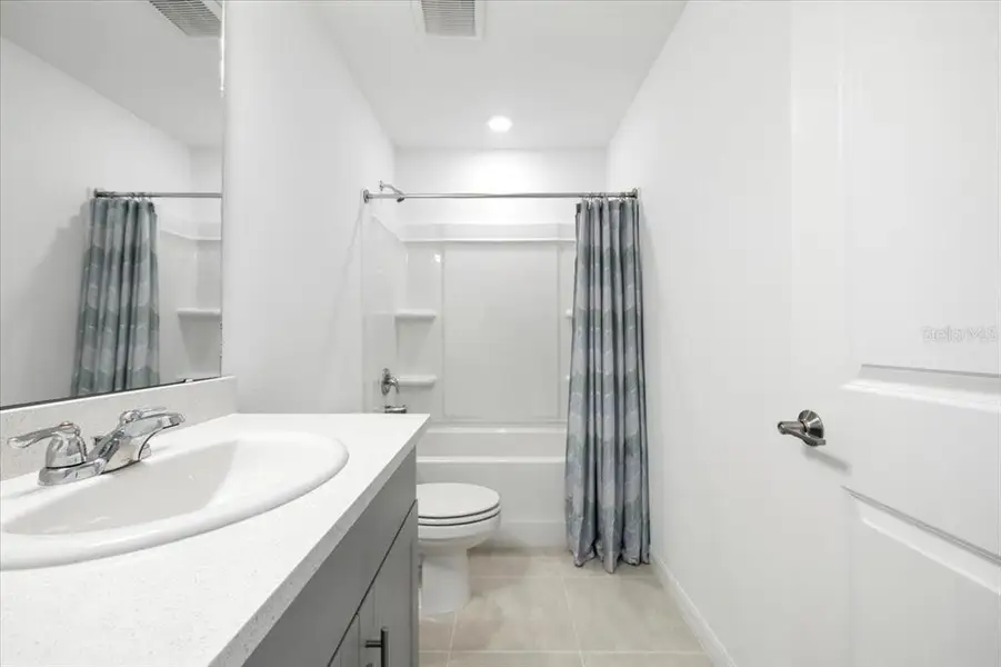 Furnished interior in a model home at The Townhomes at Azario Lakewood Ranch in Bradenton (Image 6).