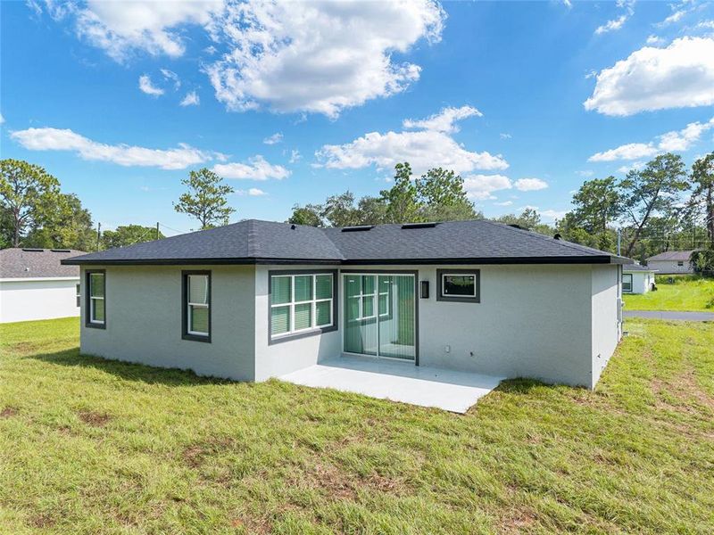 Front exterior of a new home in , Ocala, FL, highlighting curb appeal (Image 2).