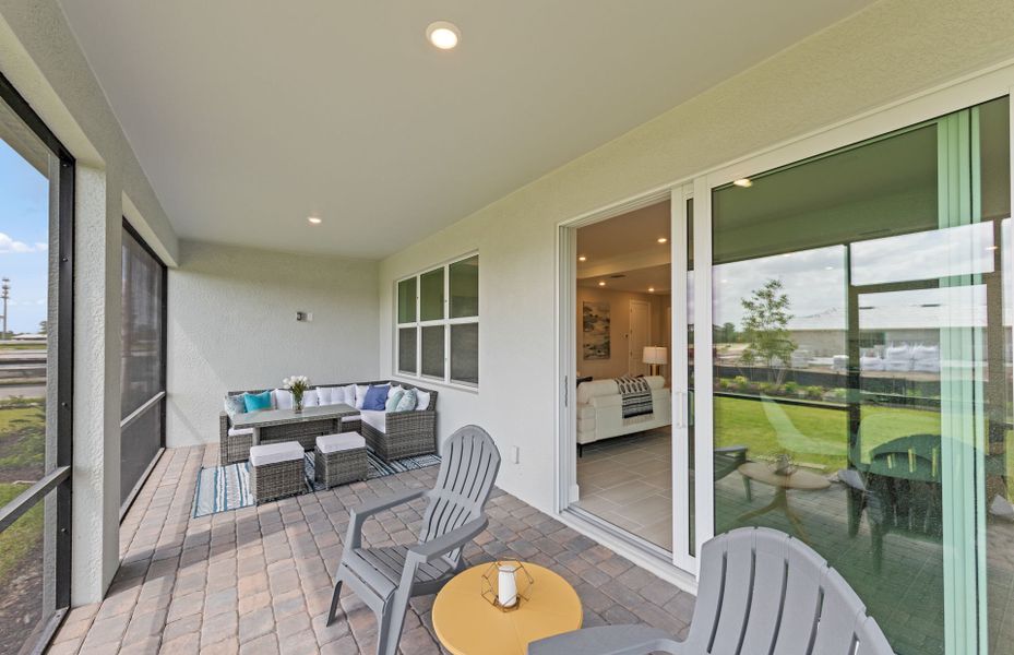 Exterior details and patio area of a home in Del Webb Oak Creek, North Fort Myers (Image 3).