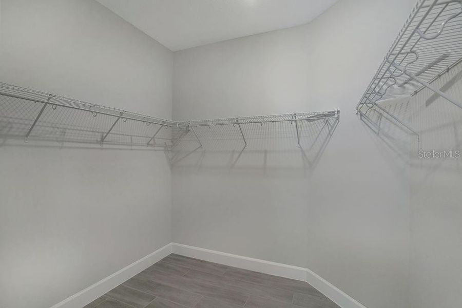 Spacious, unfurnished interior of a new home in Esplanade at Center Lake Ranch, St. Cloud (Image 26).