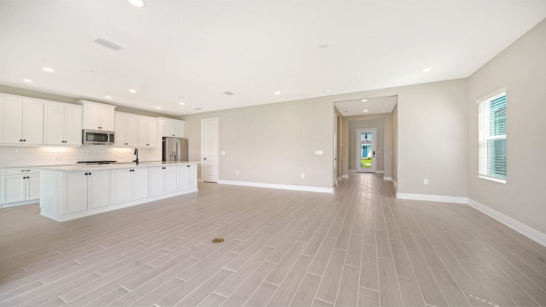 Spacious, unfurnished interior of a new home in Windward Real Estate and Homes for Sale in Sarasota, FL - Neal Communities, Lakewood Ranch (Image 16).
