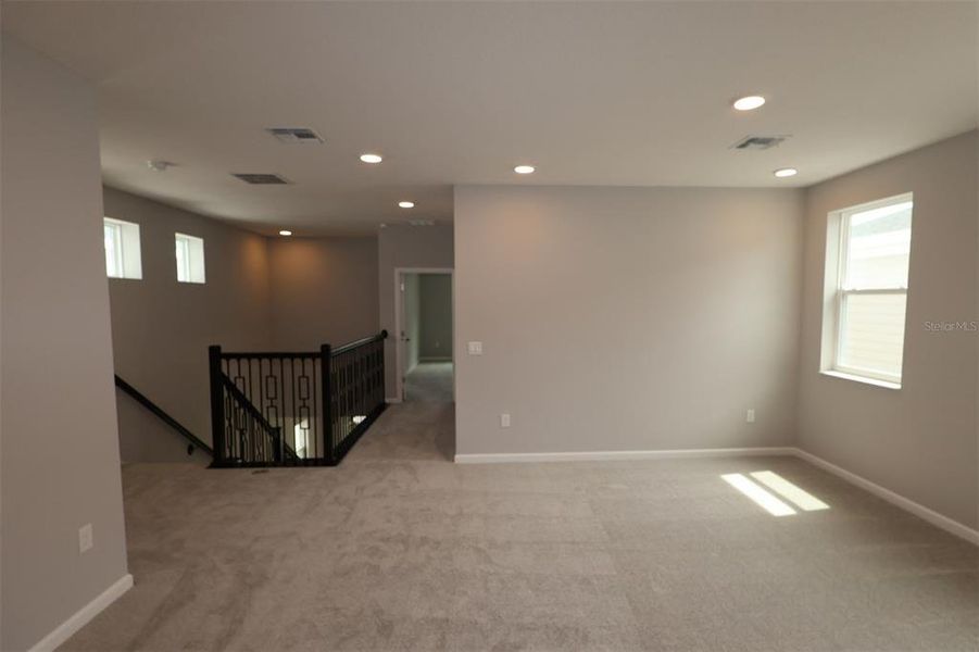 Spacious, unfurnished interior of a new home in Center Lake on the Park, St. Cloud (Image 52).