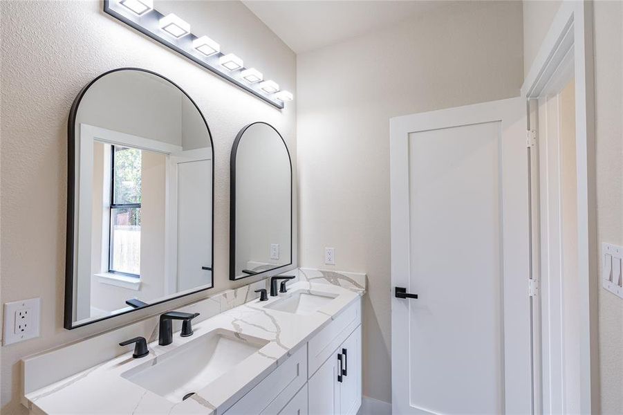 Bathroom featuring vanity