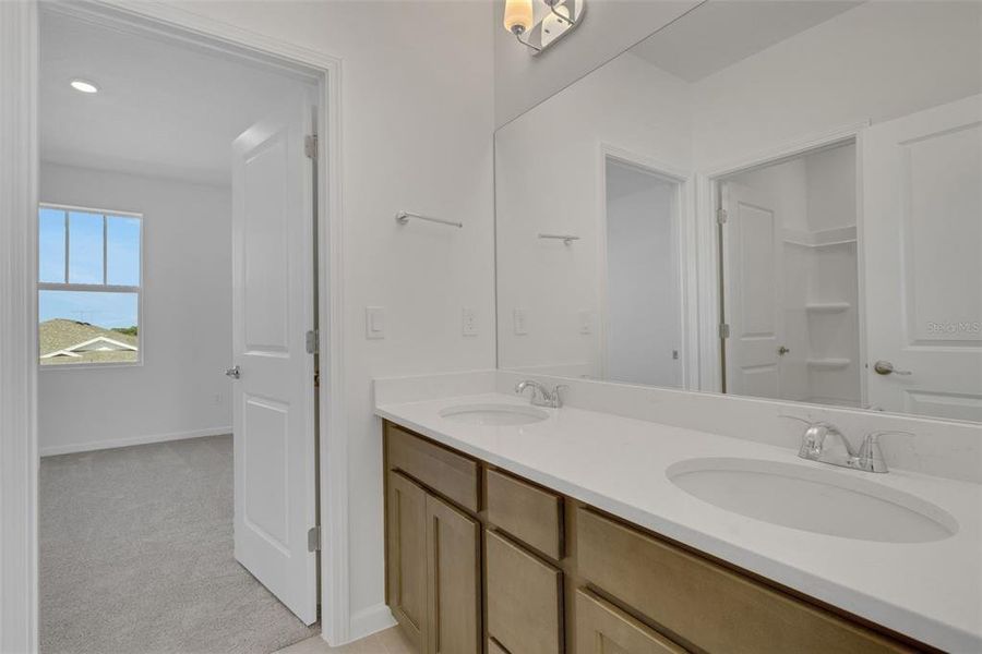 Furnished interior view inside a new home in Brystol North at Wylder, Port St. Lucie (Image 8).