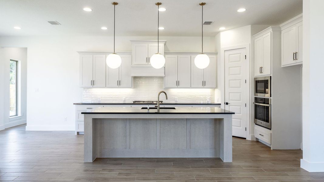 Furnished interior view inside a new home in Parkside on the River West, Georgetown (Image 8).