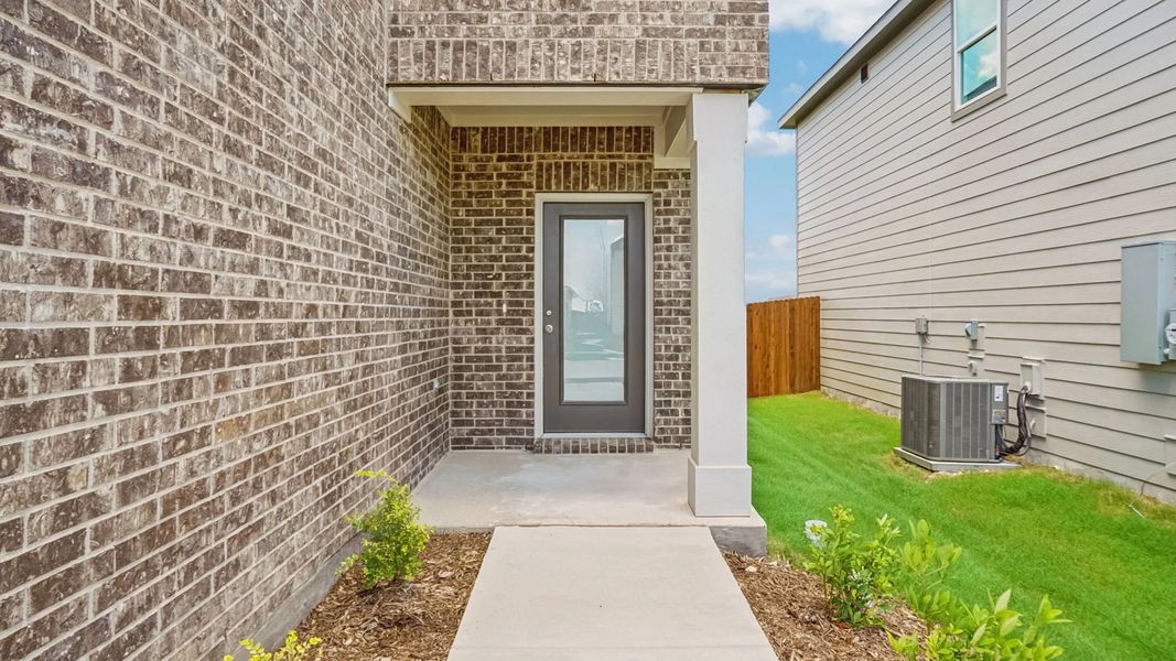 Representative exterior details of a home built from the Discovery by Starlight Homes in Coyote Meadows, Anna (Image 25). Representative exterior details of a home built from the Discovery by Starlight Homes in Coyote Meadows, Anna (Image 25).