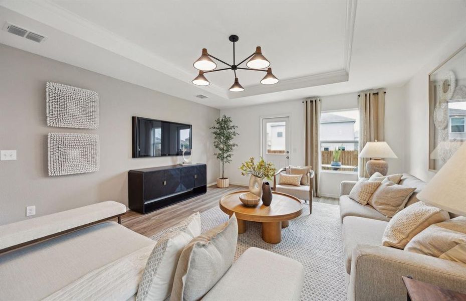 Sunlit gathering room designed for relaxation and entertainment *Model representation