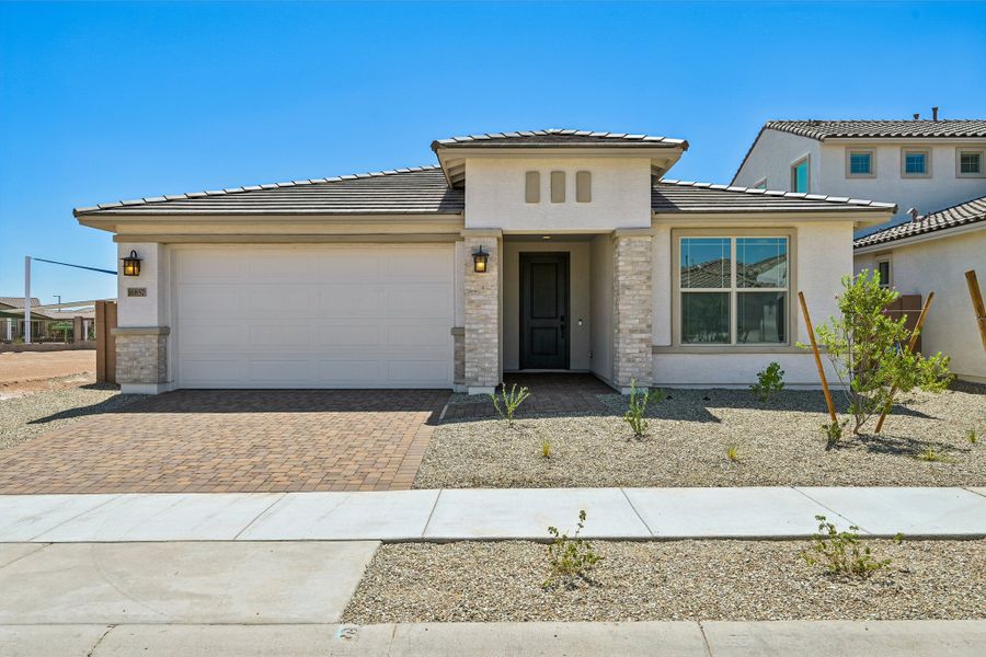 Representative exterior photo of a completed home built from the Essence by Taylor Morrison in Artisan at Asante, Surprise, AZ (Image 22). Representative exterior photo of a completed home built from the Essence by Taylor Morrison in Artisan at Asante, Surprise, AZ (Image 22).