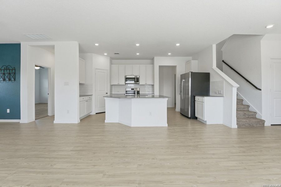 Furnished interior view inside a new home in Guadalupe Heights, Seguin (Image 9).