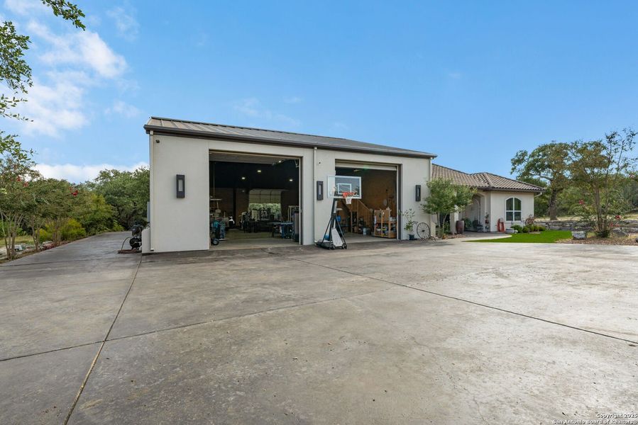 Front exterior of a new home in , Bulverde, TX, highlighting curb appeal (Image 22). Front exterior of a new home in , Bulverde, TX, highlighting curb appeal (Image 22).
