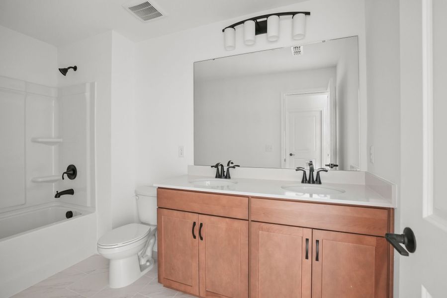 Furnished interior view inside a new home in Forest Creek, Waxhaw (Image 35).