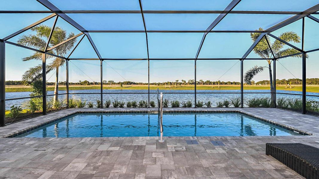 Exterior details and patio area of a home in SkySail Real Estate and Homes for Sale in Naples, FL - Neal Communities, Naples (Image 4).