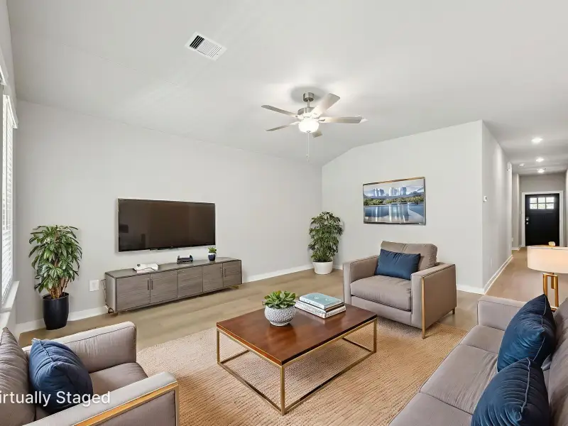 Furnished interior view inside a new home in Pine Lake Cove - Premier Series, Montgomery (Image 3).