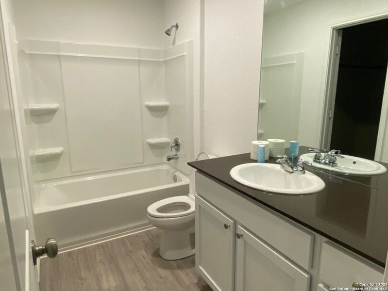 Furnished interior view inside a new home in , Converse (Image 4). Furnished interior view inside a new home in , Converse (Image 4).