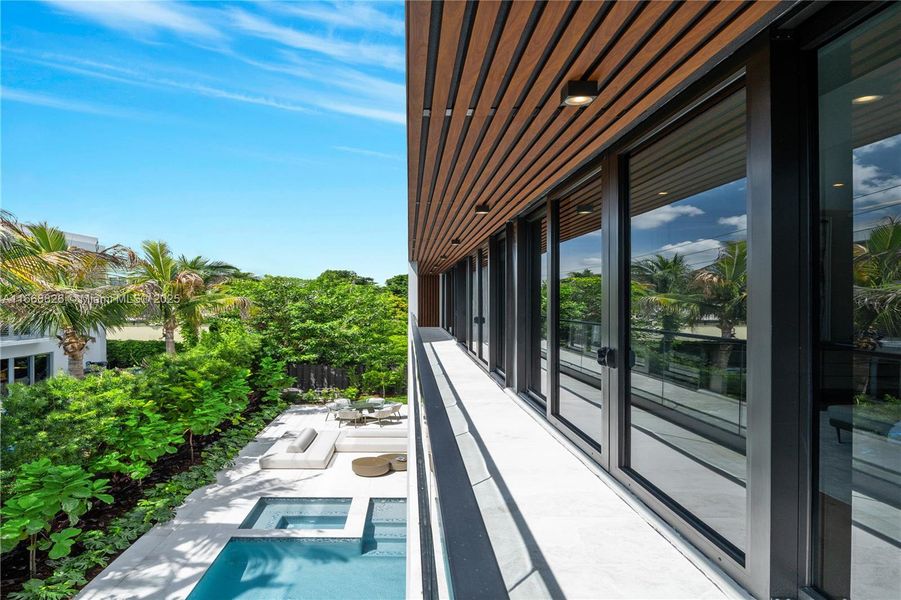 Front exterior of a new home in , Sunny Isles Beach, FL, highlighting curb appeal (Image 1).