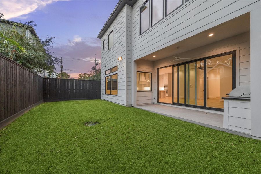 Exterior details and patio area of a home in , Houston (Image 3).