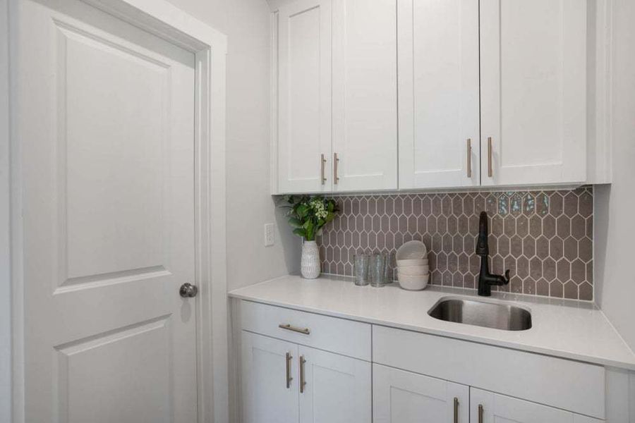 Messy Kitchen Leading to Pantry