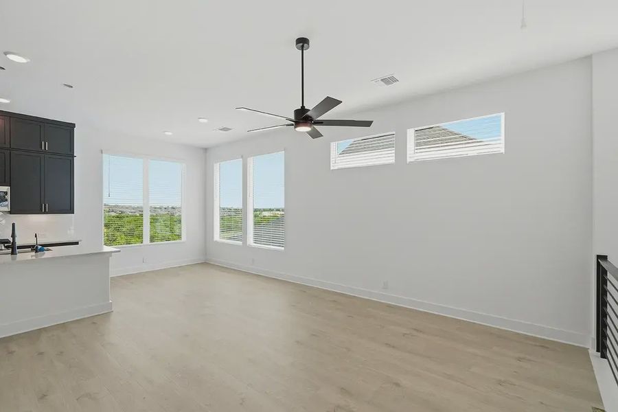 Representative unfurnished interior of a home built from the Athena by Chesmar Homes in Prominence Urban, San Antonio (Image 21).