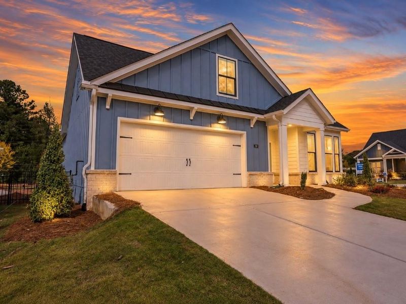 Front exterior of a new home in , Holly Springs, GA, highlighting curb appeal (Image 24).