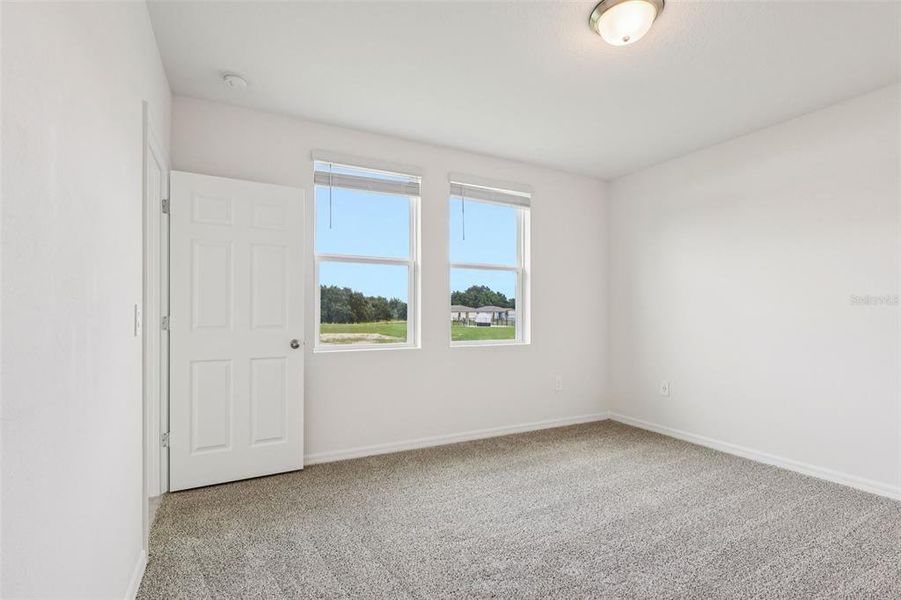 Spacious, unfurnished interior of a new home in Bradbury Creek - Classic Series, Haines City (Image 24).