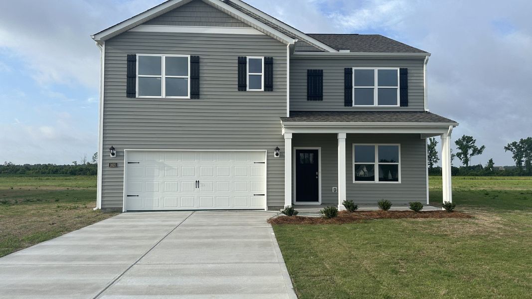 Front exterior of a new home in Dail Farm, Farmville, NC, highlighting curb appeal (Image 1). Front exterior of a new home in Dail Farm, Farmville, NC, highlighting curb appeal (Image 1).