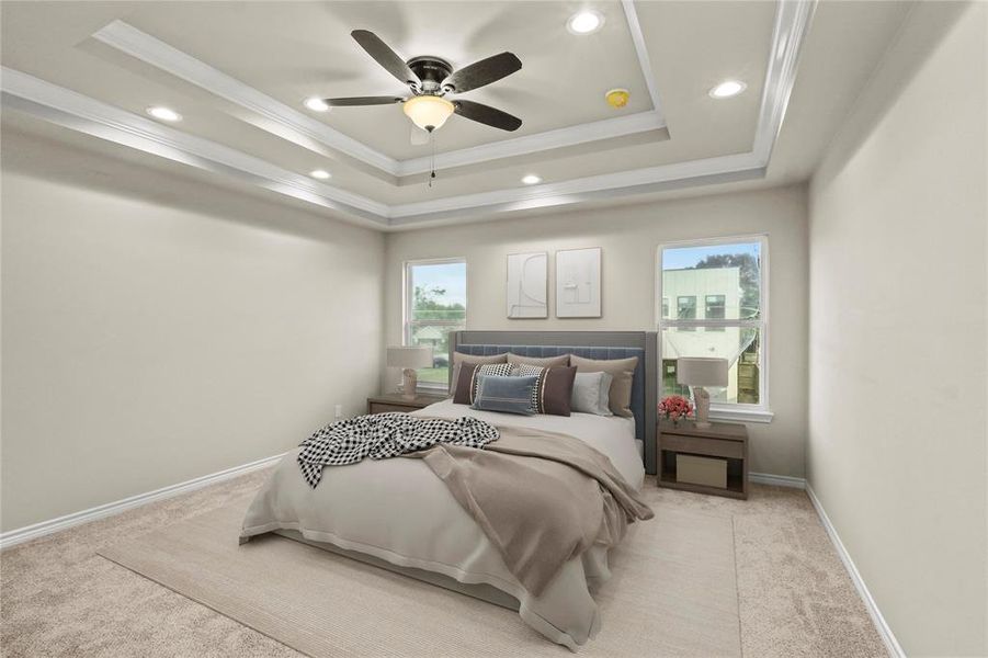 *Virtually Staged* Bedroom with a tray ceiling, crown molding, light carpet, and ceiling fan