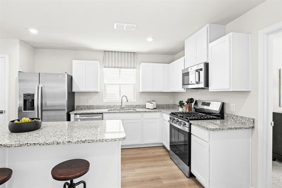 Representative furnished interior of a home built from the Reese by Ryan Homes in Middle Creek Village Single Family Homes, Bolivia (Image 4).
