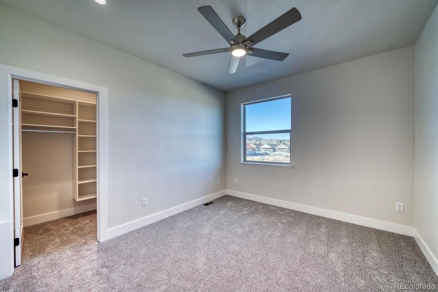 bedroom with walk in closet