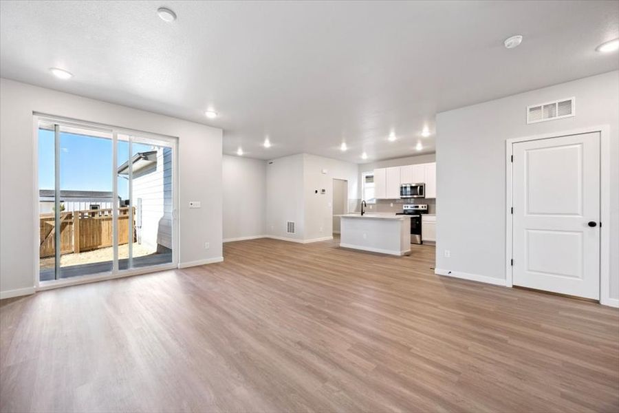 A large empty living room. A large empty living room.