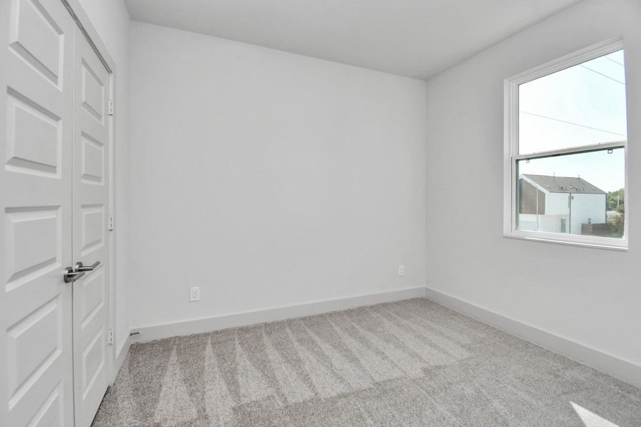 Spacious, unfurnished interior of a new home in Antigua, Houston (Image 24).