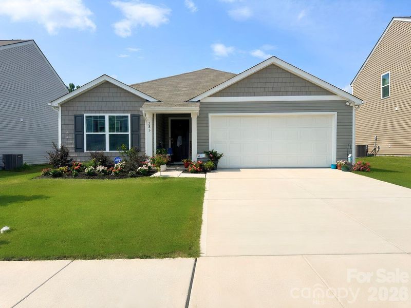 Front exterior of a new home in Woodhaven at Chester, Chester, SC, highlighting curb appeal (Image 22).