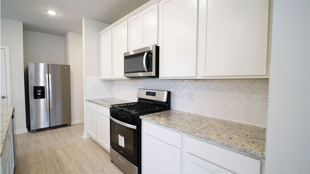 Furnished interior view inside a new home in Lonestar Collection at Aurora, Katy (Image 7).