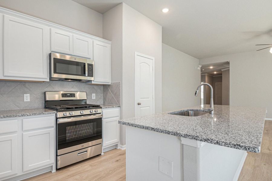 Furnished interior view inside a new home in Clear View Estates, Willis (Image 5).