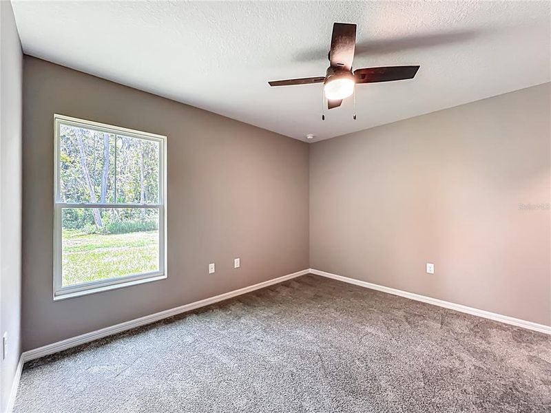 Spacious, unfurnished interior of a new home in , Lake Panasoffkee (Image 18).