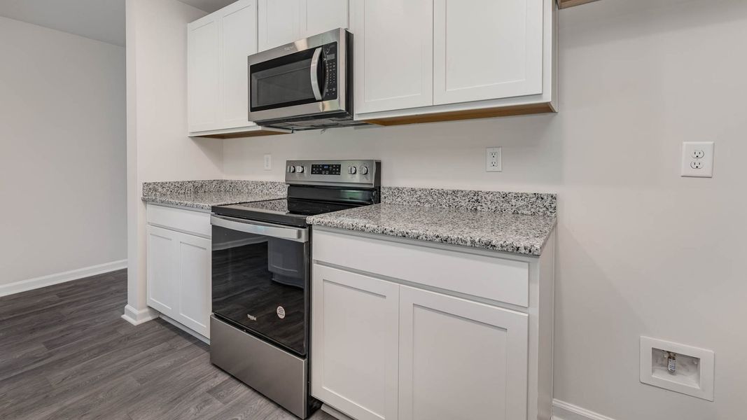 Representative furnished interior of a home built from the WREN by D.R. Horton in Cedar Hill Landing, Navassa (Image 7).