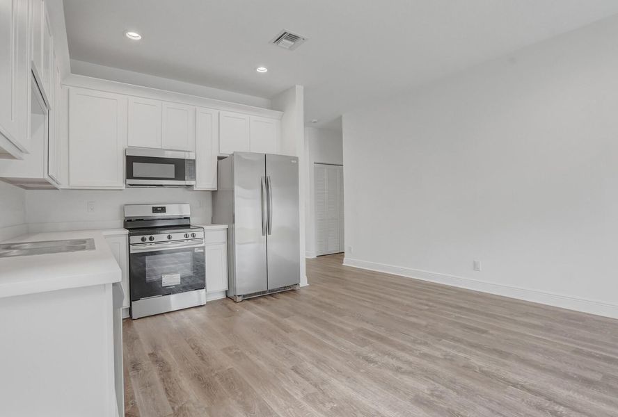 Furnished interior view inside a new home in , Lantana (Image 6). Furnished interior view inside a new home in , Lantana (Image 6).