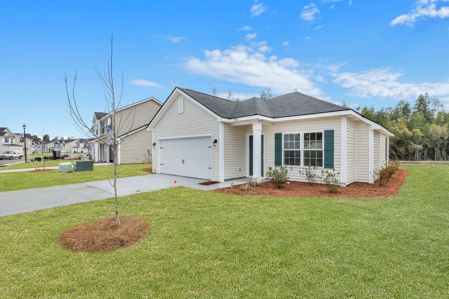 Representative exterior photo of a completed home built from the The Basswood by RTS Homes in Grand Reserve, Hinesville, GA (Image 18). Representative exterior photo of a completed home built from the The Basswood by RTS Homes in Grand Reserve, Hinesville, GA (Image 18).