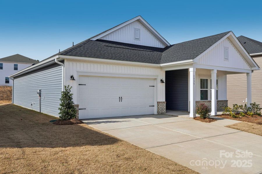 Front exterior of a new home in Harper Landing, Stanley, NC, highlighting curb appeal (Image 1).