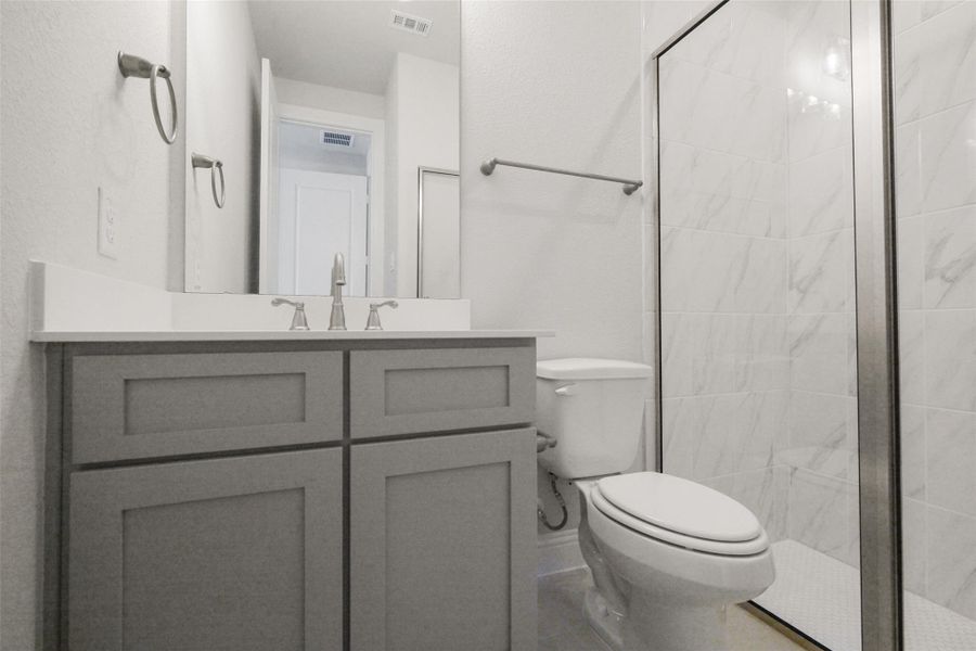 Furnished interior view inside a new home in Sienna 65', Missouri City (Image 9).