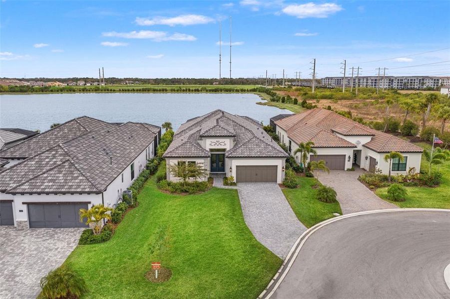 Front exterior of a new home in , Nokomis, FL, highlighting curb appeal (Image 2). Front exterior of a new home in , Nokomis, FL, highlighting curb appeal (Image 2).