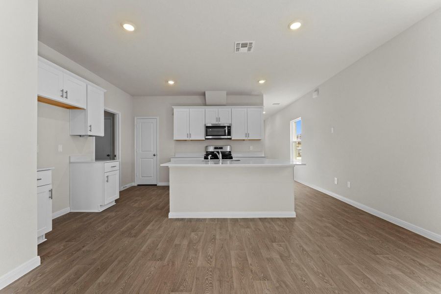 Furnished interior view inside a new home in Whisper South, San Marcos (Image 6).